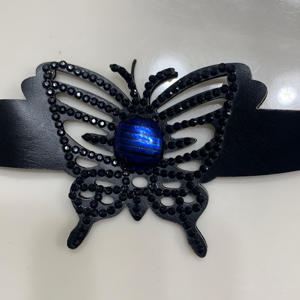 Wrist band, butterfly blue dichroic glass body.